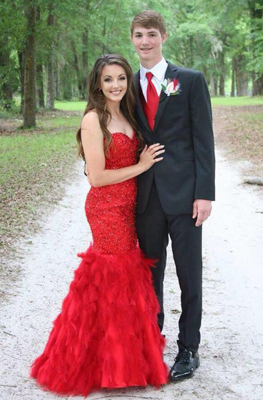 red prom dress and tux